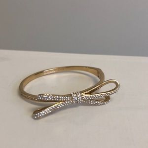 Kate spade diamond and gold tone bow tie bangle